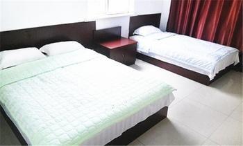 Longtai Star Hotel Qingdao Buitenkant foto