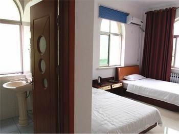 Longtai Star Hotel Qingdao Buitenkant foto